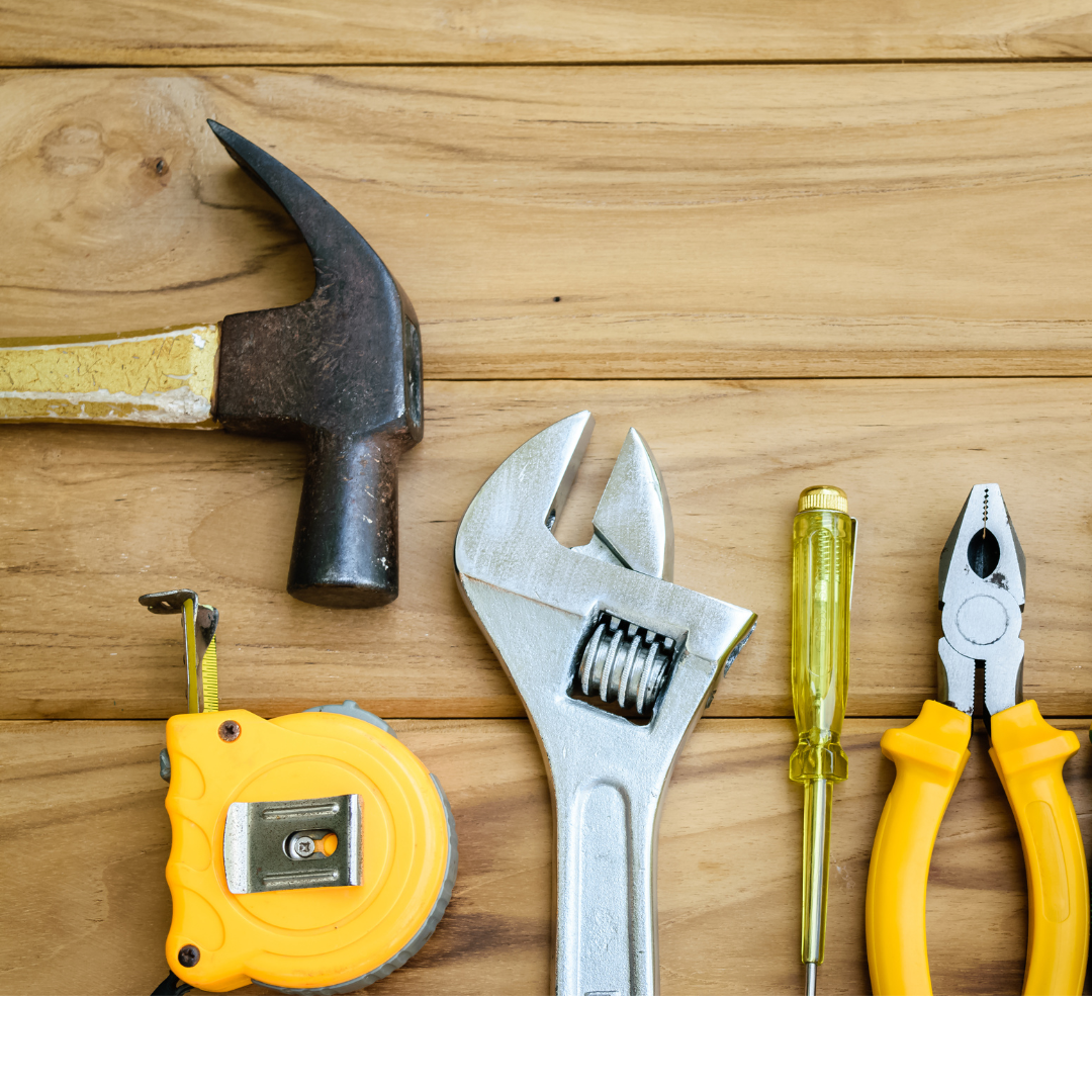 Hammer, tape measure, wrench, screwdriver and pliers